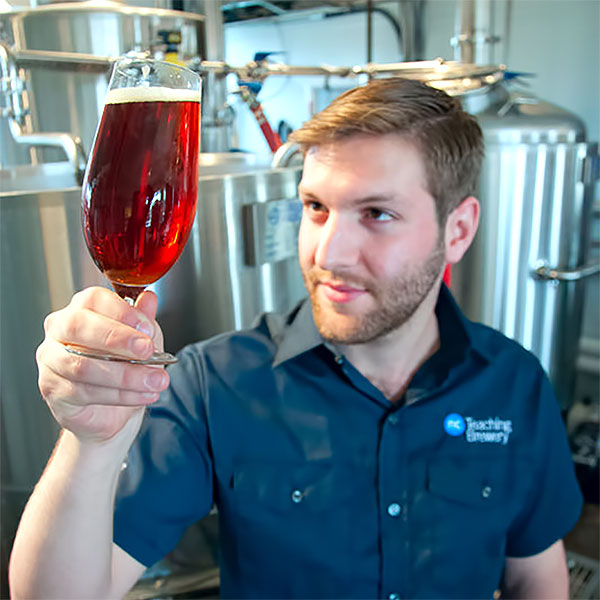 Student checks on beer colour